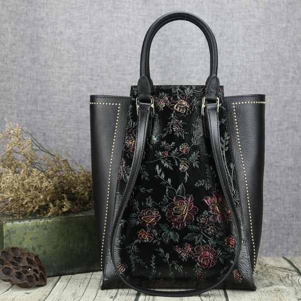 национальный стиль новый топ кожа кожа большой емкости для протирания цвет сумочка мода заклепки мать сумка
национальный стиль новый топ кожа кожа большой емкости для протирания цвет сумочка мода заклепки мать сумка