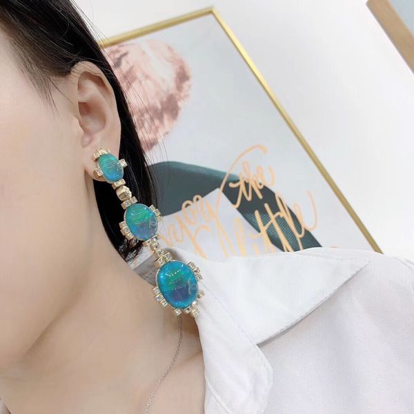 Luxury quality drop earring with blue tone fa hion brand name earring in 925 ilver needle p 6831a, Golden
Luxury quality drop earring with blue tone fa hion brand name earring in 925 ilver needle p 6831a, Golden