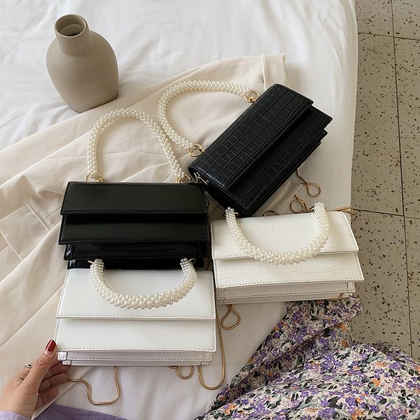 pearl handle small pu leather crossbody bags for women 2020 elegant solid color shoulder handbags female travel totes
pearl handle small pu leather crossbody bags for women 2020 elegant solid color shoulder handbags female travel totes