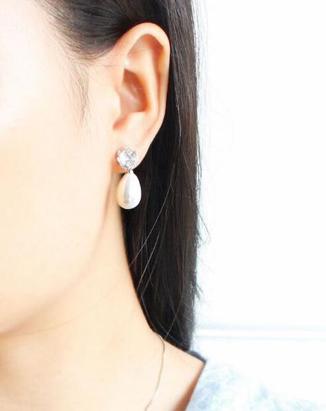 new european and american fashion style earrings micro set a diamond pearl drop pendant fashion classic exquisite elegance, Silver
new european and american fashion style earrings micro set a diamond pearl drop pendant fashion classic exquisite elegance, Silver