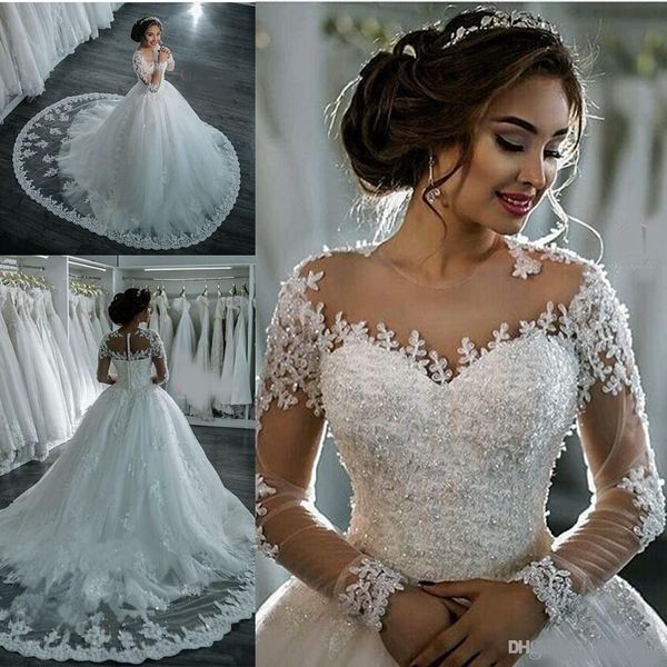 2020 dubai elegant long sleeves a-line wedding dresses sheer crew neck lace appliques beaded vestios de novia bridal gowns with buttons, White
2020 dubai elegant long sleeves a-line wedding dresses sheer crew neck lace appliques beaded vestios de novia bridal gowns with buttons, White