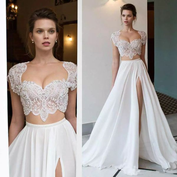 2019 Sexy Sweetheart Boho A-Line Wedding Dresses Cap Sleeves High Split Crystals Two Pieces Bridal Gowns Plus Size Custom Made Vestidos
2019 Sexy Sweetheart Boho A-Line Wedding Dresses Cap Sleeves High Split Crystals Two Pieces Bridal Gowns Plus Size Custom Made Vestidos
