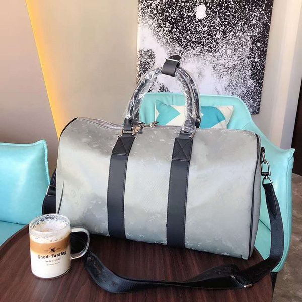 the new titanium alloy 47 cm hold-all m44170 duffel hand luggage travel bags men duffle bag backpacks handbag
the new titanium alloy 47 cm hold-all m44170 duffel hand luggage travel bags men duffle bag backpacks handbag