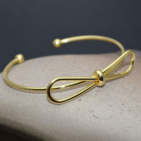 classical bowknot shape gold plating open metal bangles for women jewelry 58mm diameter women bracelets 20pcs/lot, Black
classical bowknot shape gold plating open metal bangles for women jewelry 58mm diameter women bracelets 20pcs/lot, Black