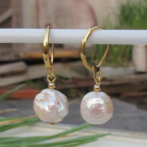 lovely 10x11mm south sea natural rose gold gold drop pearl earrings 14 k / 20, Golden
lovely 10x11mm south sea natural rose gold gold drop pearl earrings 14 k / 20, Golden