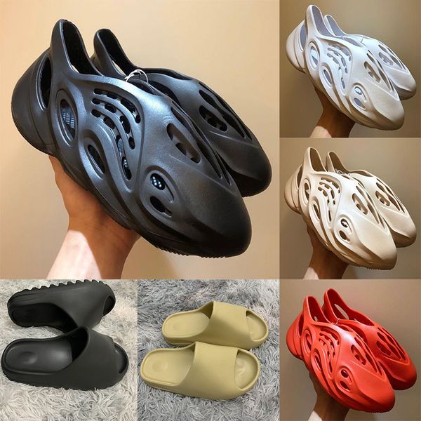 wholesale 2020 fashion kanye slides foam runner r mens women triple black white sand resin stock x summer slippers sandals 36-45
wholesale 2020 fashion kanye slides foam runner r mens women triple black white sand resin stock x summer slippers sandals 36-45