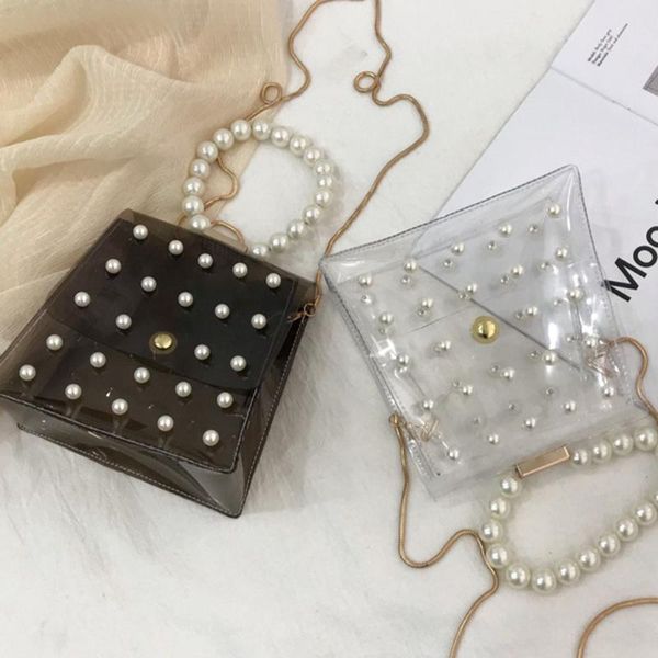 chain clear shoulder messenger bag faux pearls pvc transparent crossbody fashionable portable handle handbag
chain clear shoulder messenger bag faux pearls pvc transparent crossbody fashionable portable handle handbag