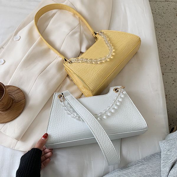 vintage fashion crocodile pattern armpit bag 2020 new korean version of the pearl clutch shoulder magnetic buckle women's bag
vintage fashion crocodile pattern armpit bag 2020 new korean version of the pearl clutch shoulder magnetic buckle women's bag