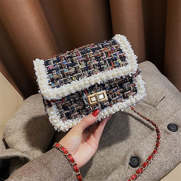 new south korean pearl decorated one shoulder messenger women's bag fashion small square bag in summer 2020
new south korean pearl decorated one shoulder messenger women's bag fashion small square bag in summer 2020