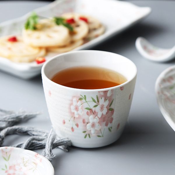 early spring cherry blossom ceramic tea cup handmade japanese water mug sushi teacup embossed sakura on white spiral texture
early spring cherry blossom ceramic tea cup handmade japanese water mug sushi teacup embossed sakura on white spiral texture