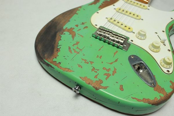 new product 100% handmade relic electric guitar r-ty64 soft2012green color alder body
new product 100% handmade relic electric guitar r-ty64 soft2012green color alder body