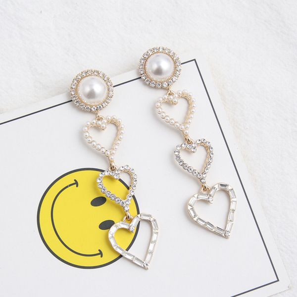 new hollow rhinestone pearl love heart long drop dangle earrings for women girls fashion korean jewelry earring brincos 6c3005, Golden
new hollow rhinestone pearl love heart long drop dangle earrings for women girls fashion korean jewelry earring brincos 6c3005, Golden