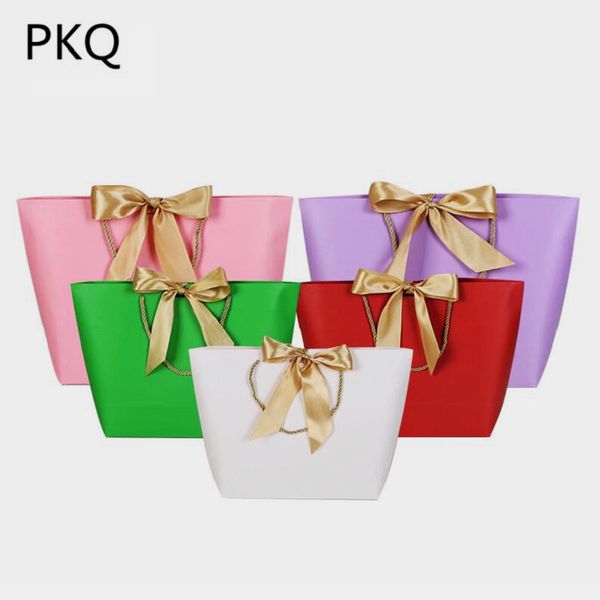 40pcs/lot wedding party favor paper gift bags for packaging craft paper bags & gold ribbon bow handles festival gift 9/7
40pcs/lot wedding party favor paper gift bags for packaging craft paper bags & gold ribbon bow handles festival gift 9/7
