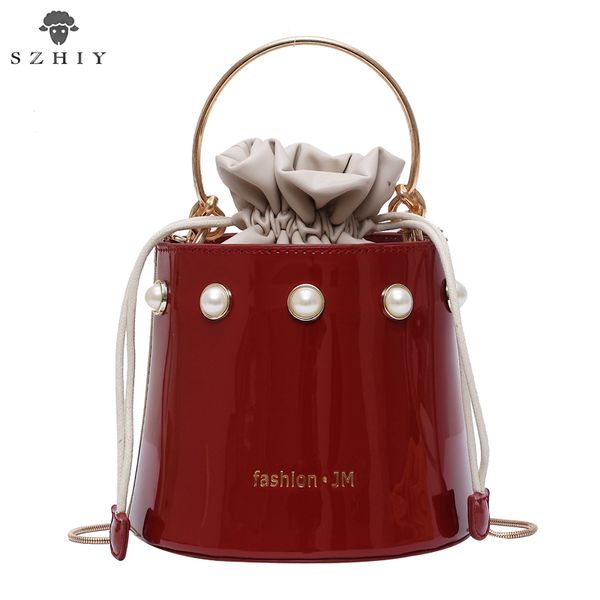 women shoulder bags fashion bucket pu leather handbag snake bone chain crossbody bags small pearl buckets ring
women shoulder bags fashion bucket pu leather handbag snake bone chain crossbody bags small pearl buckets ring