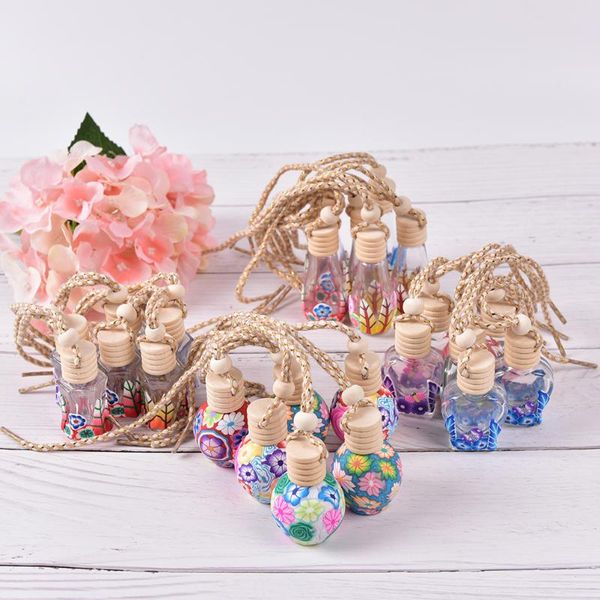 glass perfume bottle 12ml polymer clay vials fragrance bottle charming pendant decoration for essential oil car decoration
glass perfume bottle 12ml polymer clay vials fragrance bottle charming pendant decoration for essential oil car decoration