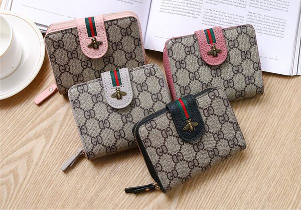 4 colors fashion designer purses women plain short wallets ladies bee leather handbags credit card holder special offer, Red;black
4 colors fashion designer purses women plain short wallets ladies bee leather handbags credit card holder special offer, Red;black