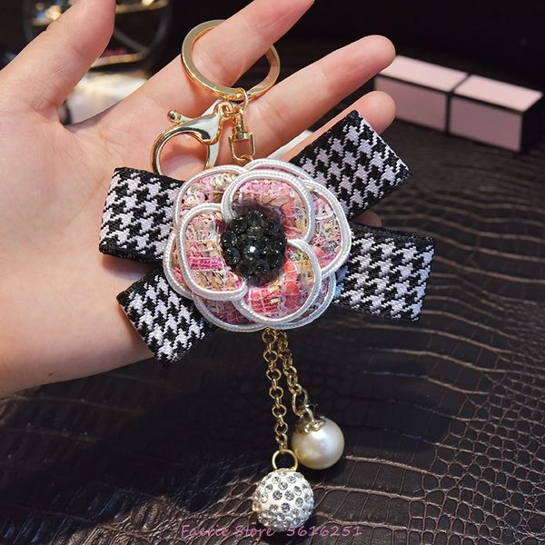 korean checked keychain bowknot pearl ball fringe key chain bright-studded camellia bag pendant car keyring woman cute, Silver
korean checked keychain bowknot pearl ball fringe key chain bright-studded camellia bag pendant car keyring woman cute, Silver