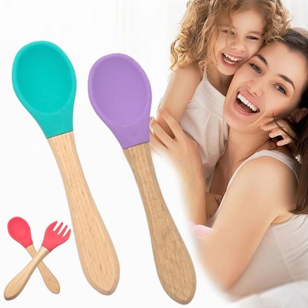 1pc baby spoon fork wooden silicone infant training spoon safety feeding flatware baby teething soothing toy kids feeding spoon
1pc baby spoon fork wooden silicone infant training spoon safety feeding flatware baby teething soothing toy kids feeding spoon