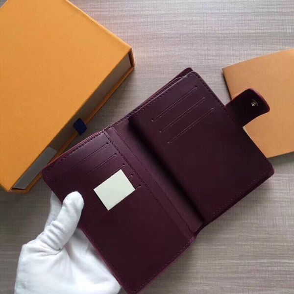 2020 classic small wallet designer female short section female student two fold patent leather embossed coin purse presbyopia mini folding c, Red;black
2020 classic small wallet designer female short section female student two fold patent leather embossed coin purse presbyopia mini folding c, Red;black