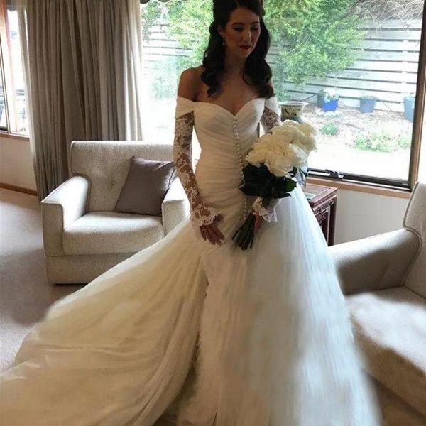 mermaid wedding dresses off the shoulder ruffles tulle bridal gowns front covered buttons custom made arabic wedding vestidos, White
mermaid wedding dresses off the shoulder ruffles tulle bridal gowns front covered buttons custom made arabic wedding vestidos, White