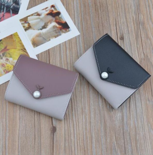 new wallet women's short wallet simple personalized hand holding mini coin wallet, Red;black
new wallet women's short wallet simple personalized hand holding mini coin wallet, Red;black