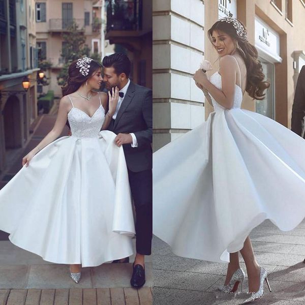 chic tea length wedding dresses with a line draped spaghetti straps backless elegant short wedding gowns lace applique bridal gowns, White
chic tea length wedding dresses with a line draped spaghetti straps backless elegant short wedding gowns lace applique bridal gowns, White