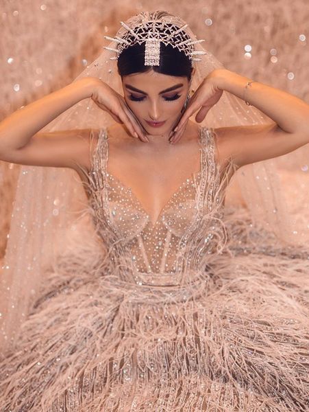 luxury champagne spaghetti ball gown wedding dresses with feathers vintage crystal beaded saudi arabic dubai plus size bridal gown, White
luxury champagne spaghetti ball gown wedding dresses with feathers vintage crystal beaded saudi arabic dubai plus size bridal gown, White