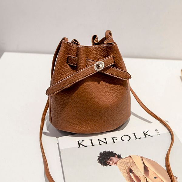 litchi pattern bucket type shoulder mobile phone bags lock core slung small bag simple elegant ladies diagonal cross bag
litchi pattern bucket type shoulder mobile phone bags lock core slung small bag simple elegant ladies diagonal cross bag
