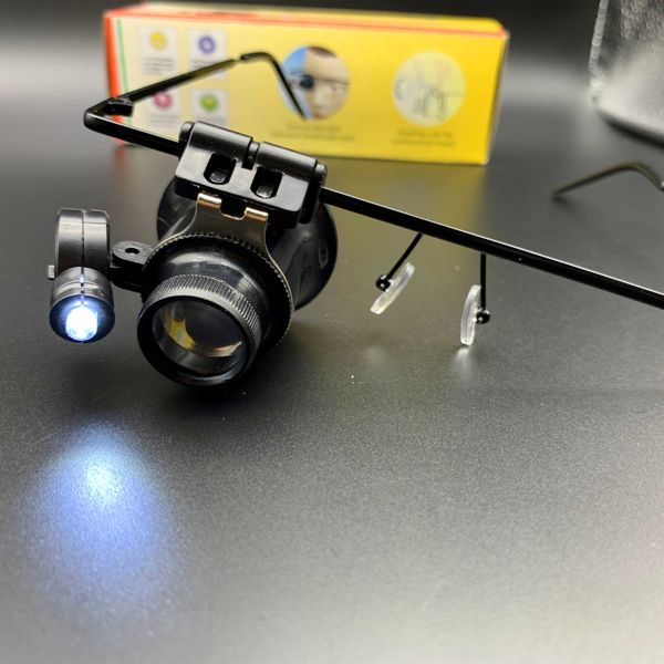20x glasses type double eye binocular magnifier watch repair tool magnifier with two adjustable led lights features: f
20x glasses type double eye binocular magnifier watch repair tool magnifier with two adjustable led lights features: f