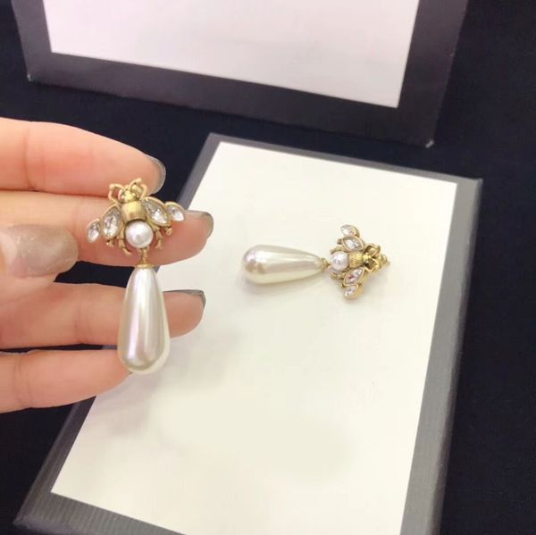 new european and american earrings ladies fashion luxury bee earrings pearl pendant with pearl jewelry, Golden;silver
new european and american earrings ladies fashion luxury bee earrings pearl pendant with pearl jewelry, Golden;silver