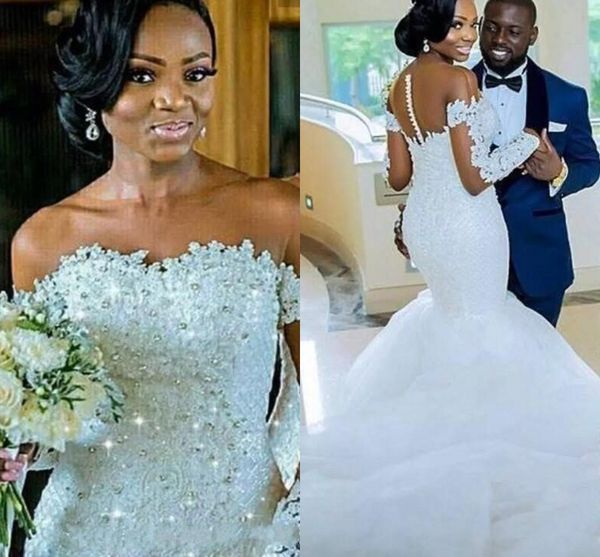 2020 african mermaid wedding dresses sheer neck off shoulder lace applique beads crystal backless with button long sleeves tulle bridal gown, White
2020 african mermaid wedding dresses sheer neck off shoulder lace applique beads crystal backless with button long sleeves tulle bridal gown, White