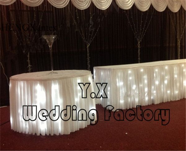 white color ice silk table skirt with led light for wedding event table cloth decoration
white color ice silk table skirt with led light for wedding event table cloth decoration