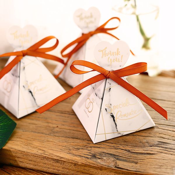 100pcs marble style gift box wedding favors and gifts triangular pyramid candy box wedding gifts for guests decoration
100pcs marble style gift box wedding favors and gifts triangular pyramid candy box wedding gifts for guests decoration