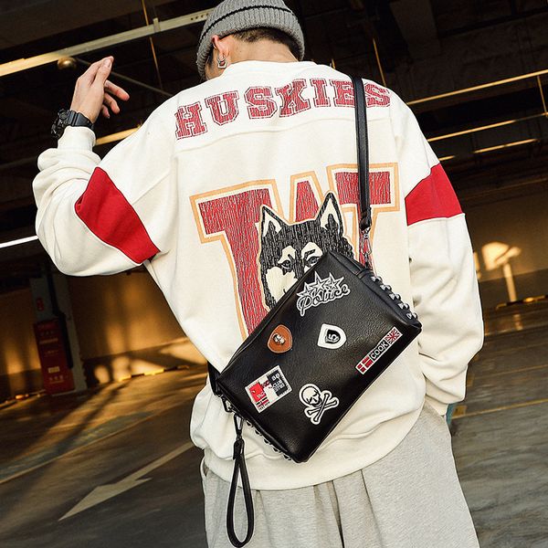 the new wave of male fashion personality badge rivet clutch wrist multifunction shoulder bag messenger bag tide of street
the new wave of male fashion personality badge rivet clutch wrist multifunction shoulder bag messenger bag tide of street