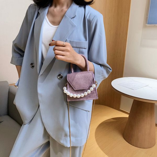 2020 new ladies shoulder bag fashion mini messenger bag shoulder small square chain pearl handbag
2020 new ladies shoulder bag fashion mini messenger bag shoulder small square chain pearl handbag