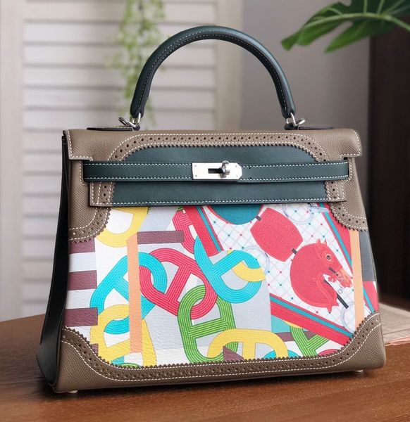 wholesale original design graffiti keily purse 32cm,togo skin handmade with wax thread,fast delivery by dhl or ems
wholesale original design graffiti keily purse 32cm,togo skin handmade with wax thread,fast delivery by dhl or ems