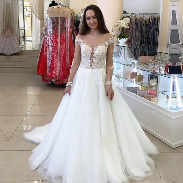 transparent long sleever sheer neck wedding dresses appliqued lace tulle a line bridal gowns sweep trail 2020 vestidos de noiva, White
transparent long sleever sheer neck wedding dresses appliqued lace tulle a line bridal gowns sweep trail 2020 vestidos de noiva, White
