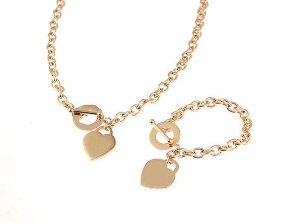 2019 gold thick chian single gold heart plate single ring stainless steel pendant necklaces and bracelet suit with box and dastbag, Silver
2019 gold thick chian single gold heart plate single ring stainless steel pendant necklaces and bracelet suit with box and dastbag, Silver