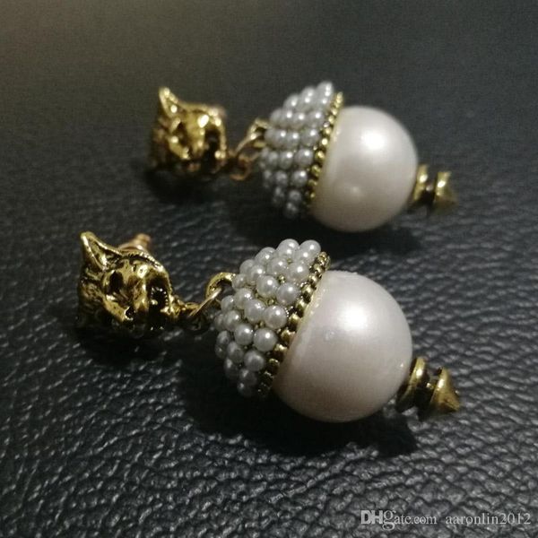 новый бренд vintage pearl leopard серьги стержня для женщин моды ювелирных изделий металла серьги кулон антик brincos женский bijoux, Golden;silver
новый бренд vintage pearl leopard серьги стержня для женщин моды ювелирных изделий металла серьги кулон антик brincos женский bijoux, Golden;silver