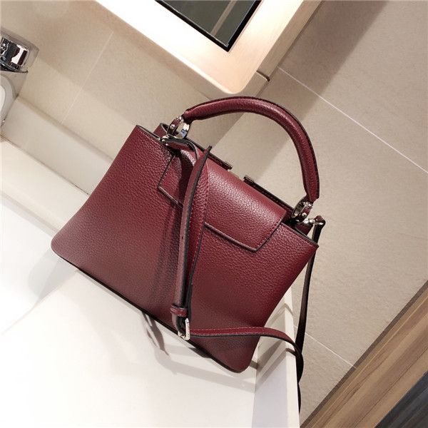 188727leather classic fashion handbag card bag zero wallet men's and women's backpacks single shoulder bag
188727leather classic fashion handbag card bag zero wallet men's and women's backpacks single shoulder bag