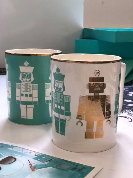 blue coffee milk cups 2pcs a set drinkware mugs robot blue ceramic cup wedding gifts good quality with gift box
blue coffee milk cups 2pcs a set drinkware mugs robot blue ceramic cup wedding gifts good quality with gift box
