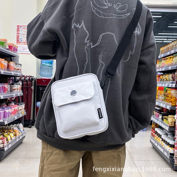 the new canvas single shoulder messenger bag embroidery foreign trade models clamshell stall
the new canvas single shoulder messenger bag embroidery foreign trade models clamshell stall