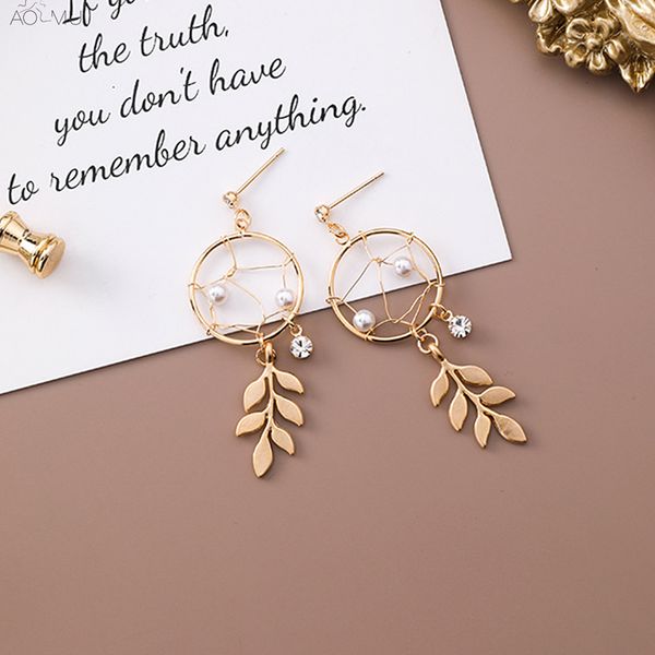 aomu s925 sterling silver pin korea crystal pearl hollow weave mesh round metal tree leaf tassel fringed drop earrings for women
aomu s925 sterling silver pin korea crystal pearl hollow weave mesh round metal tree leaf tassel fringed drop earrings for women