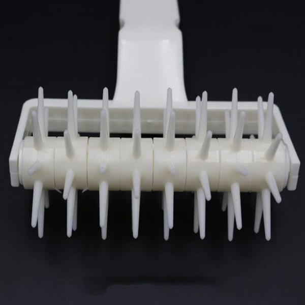 dough puncher plastic bread needle puncher pizza needle roller crust cookies biscuit puncher decoration cooking tool 
dough puncher plastic bread needle puncher pizza needle roller crust cookies biscuit puncher decoration cooking tool