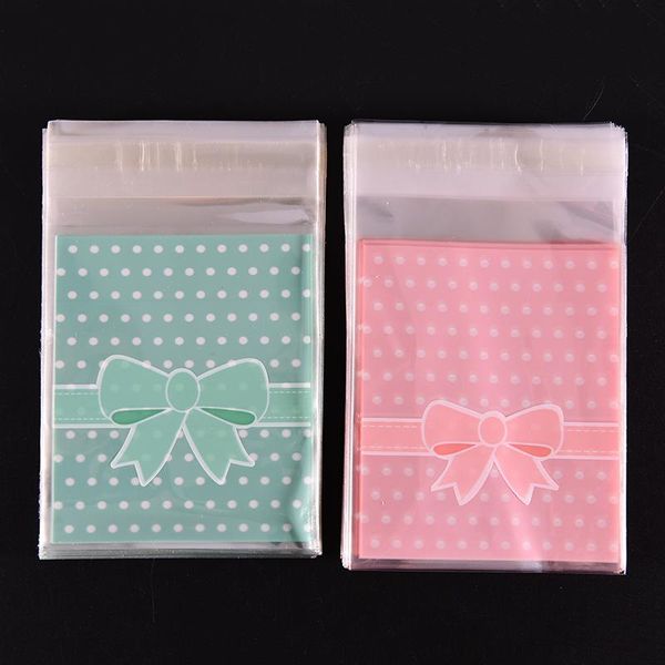100pcs/bag cookie candy opp pack bags pink blue plastic lovely bow design adhesive cake gift packages for gift
100pcs/bag cookie candy opp pack bags pink blue plastic lovely bow design adhesive cake gift packages for gift