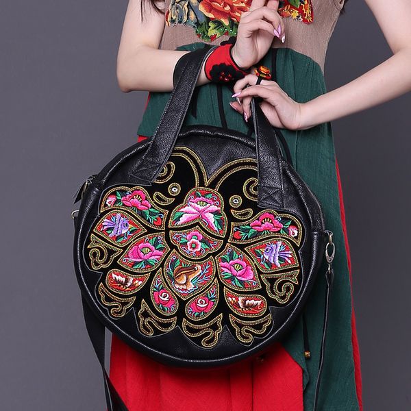 classic national style hand-held leather women's bag butterfly mother embroidery big round bag drum
classic national style hand-held leather women's bag butterfly mother embroidery big round bag drum