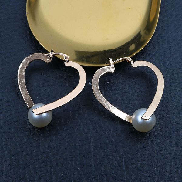 2019 new bright pearl earrings love heart peach heart-shaped original alloy european and american earrings female wholesale, Silver
2019 new bright pearl earrings love heart peach heart-shaped original alloy european and american earrings female wholesale, Silver