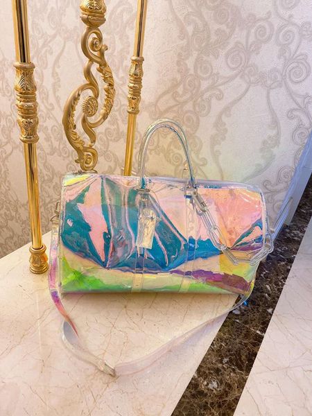 laser printing chain hand luggage travel bag pvc duffel men and women one shoulder large transparent fashion female package
laser printing chain hand luggage travel bag pvc duffel men and women one shoulder large transparent fashion female package