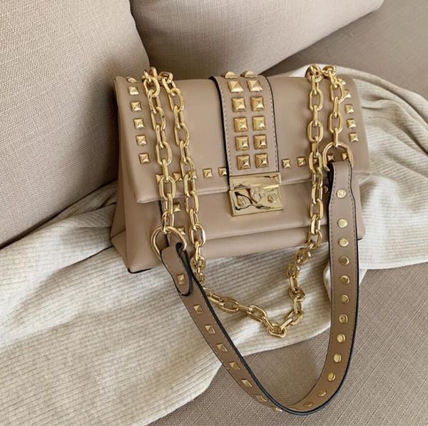 european fashion female rivet tote bag 2020 new quality pu leather women's handbag lock chain shoulder messenger bag
european fashion female rivet tote bag 2020 new quality pu leather women's handbag lock chain shoulder messenger bag