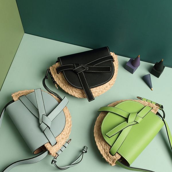 beach du jia feng vintage straw bags leather bow weaving color saddle bag messenger bag
beach du jia feng vintage straw bags leather bow weaving color saddle bag messenger bag